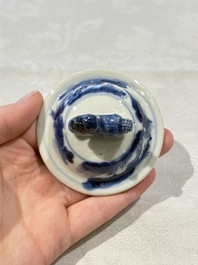 Two pairs of Chinese blue and white covered vases and a large covered vase, 19th C.