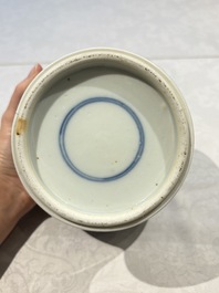Two pairs of Chinese blue and white covered vases and a large covered vase, 19th C.