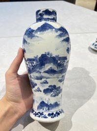 Two pairs of Chinese blue and white covered vases and a large covered vase, 19th C.