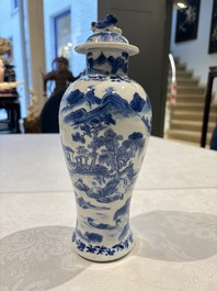 Two pairs of Chinese blue and white covered vases and a large covered vase, 19th C.