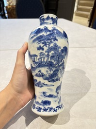 Two pairs of Chinese blue and white covered vases and a large covered vase, 19th C.