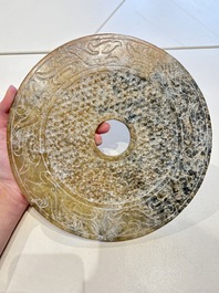 Four large Chinese archaistic jade 'bi' discs, 20th C.