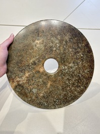 Four large Chinese archaistic jade 'bi' discs, 20th C.
