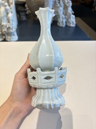 A pair of Chinese qingbai vases and a cup on a stand, 20th C.