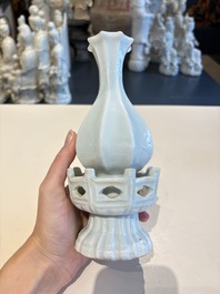 A pair of Chinese qingbai vases and a cup on a stand, 20th C.