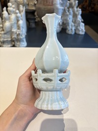 A pair of Chinese qingbai vases and a cup on a stand, 20th C.