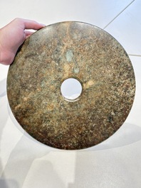Four large Chinese archaistic jade 'bi' discs, 20th C.