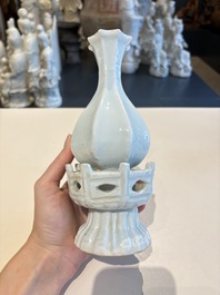 A pair of Chinese qingbai vases and a cup on a stand, 20th C.