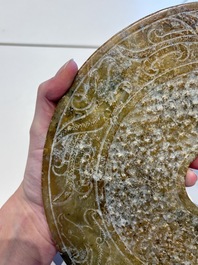 Four large Chinese archaistic jade 'bi' discs, 20th C.