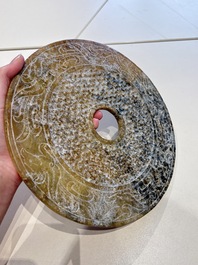 Four large Chinese archaistic jade 'bi' discs, 20th C.