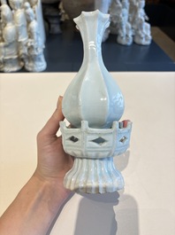 A pair of Chinese qingbai vases and a cup on a stand, 20th C.