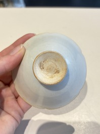 A pair of Chinese qingbai vases and a cup on a stand, 20th C.