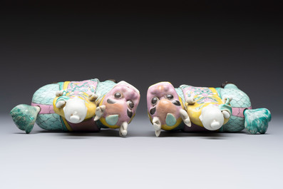 A pair of Chinese famille rose models of a boy riding a qilin and a bitong, 19/20th C.