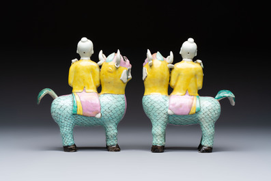 A pair of Chinese famille rose models of a boy riding a qilin and a bitong, 19/20th C.