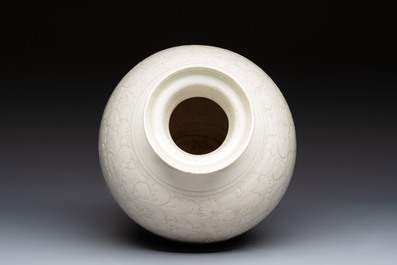 A Chinese qingbai 'Meiping' vase with incised floral design, Yuan or later