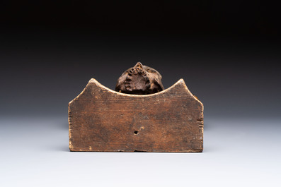 An Italian 'Memento Mori' wooden funerary palm holder with a plaster skull, 19th C.