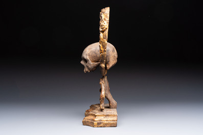 An Italian 'Memento Mori' wooden funerary palm holder with a plaster skull, 19th C.
