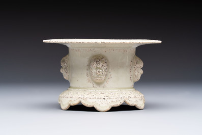 A Chinese qingbai censer with masks in relief, 20th C