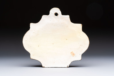 A rare blue and white yellow-ground Dutch Delft plaque with a black border, 18th C.