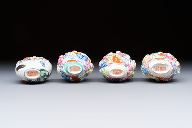 Four Chinese famille rose moulded 'Luohan' snuff bottles, Qianlong marks, 19th C.