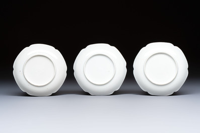 Three fine Chinese eggshell iron-red and gilt-decorated 'Boy and Goats' cups and saucers, Yongzheng