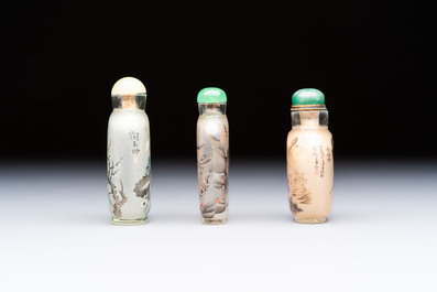 A Chinese rock crystal and two glass inside painted snuff bottles, 19/20th C., with a signed copy of 'Chinese Inside Painting of the Modern Age', 2005