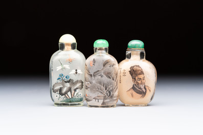 A Chinese rock crystal and two glass inside painted snuff bottles, 19/20th C., with a signed copy of 'Chinese Inside Painting of the Modern Age', 2005