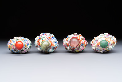 Four Chinese famille rose moulded 'Luohan' snuff bottles, Qianlong marks, 19th C.