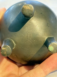 A Chinese silver-inlaid bronze tripod censer with clouds design, 19th C.