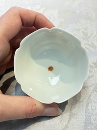 Three fine Chinese eggshell iron-red and gilt-decorated 'Boy and Goats' cups and saucers, Yongzheng