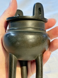 A Chinese silver-inlaid bronze tripod censer with clouds design, 19th C.