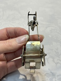 A Chinese enamelled silver model of four bearers and a silver model of a bearer, Guang Sheng Yuan 廣生源 and Yan Ji 衍記 mark, 19th C.