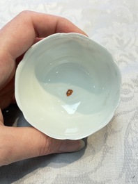 Three fine Chinese eggshell iron-red and gilt-decorated 'Boy and Goats' cups and saucers, Yongzheng