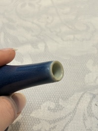 A pair of Chinese blue-glazed 'Hatcher Cargo' vases with incised dragons and a stem cup, Transitional period