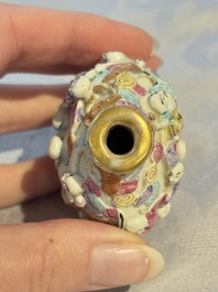 Four Chinese famille rose moulded 'Luohan' snuff bottles, Qianlong marks, 19th C.