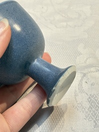 A pair of Chinese blue-glazed 'Hatcher Cargo' vases with incised dragons and a stem cup, Transitional period