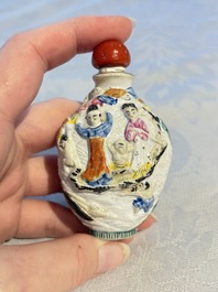 Four Chinese famille rose moulded 'Luohan' snuff bottles, Qianlong marks, 19th C.