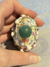 Four Chinese famille rose moulded 'Luohan' snuff bottles, Qianlong marks, 19th C.