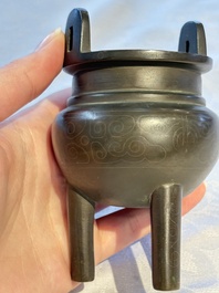 A Chinese silver-inlaid bronze tripod censer with clouds design, 19th C.