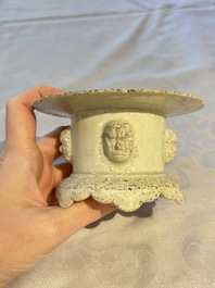 A Chinese qingbai censer with masks in relief, 20th C