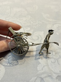 A Chinese enamelled silver model of four bearers and a silver model of a bearer, Guang Sheng Yuan 廣生源 and Yan Ji 衍記 mark, 19th C.