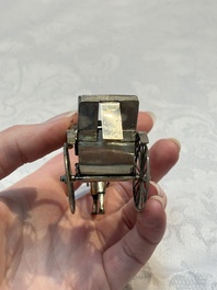 A Chinese enamelled silver model of four bearers and a silver model of a bearer, Guang Sheng Yuan 廣生源 and Yan Ji 衍記 mark, 19th C.