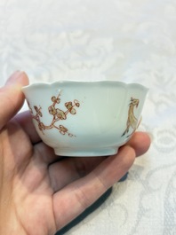 Three fine Chinese eggshell iron-red and gilt-decorated 'Boy and Goats' cups and saucers, Yongzheng