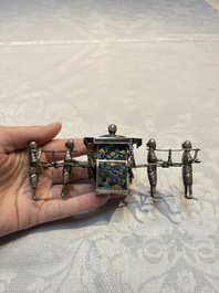 A Chinese enamelled silver model of four bearers and a silver model of a bearer, Guang Sheng Yuan 廣生源 and Yan Ji 衍記 mark, 19th C.