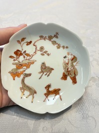 Three fine Chinese eggshell iron-red and gilt-decorated 'Boy and Goats' cups and saucers, Yongzheng