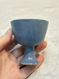A pair of Chinese blue-glazed 'Hatcher Cargo' vases with incised dragons and a stem cup, Transitional period