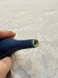 A pair of Chinese blue-glazed 'Hatcher Cargo' vases with incised dragons and a stem cup, Transitional period