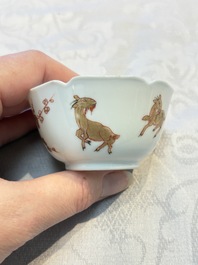 Three fine Chinese eggshell iron-red and gilt-decorated 'Boy and Goats' cups and saucers, Yongzheng
