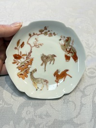 Three fine Chinese eggshell iron-red and gilt-decorated 'Boy and Goats' cups and saucers, Yongzheng