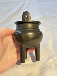 A Chinese silver-inlaid bronze tripod censer with clouds design, 19th C.